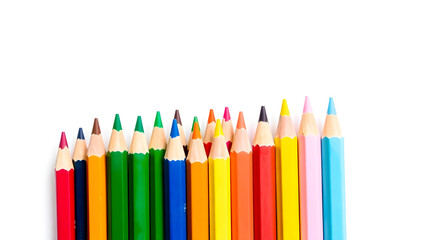 Fototapeta premium a set of vibrant colored pencils arranged in a row, ideal for art, drawing, and creative projects