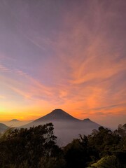 Many domestic tourists capture the a sunrise at the top of Sikunir Hill