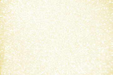 Yellow white bokeh background. Photo can be used for the concepts of New Year, Christmas, Wedding Anniversary and all celebrations.