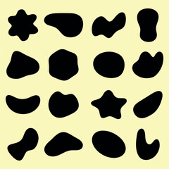 Fototapeta premium Abstract black shapes on a yellow background. Various organic shapes create a playful pattern. Shapes include stars and blobs, forming a unique abstract design. Black shape vector set.