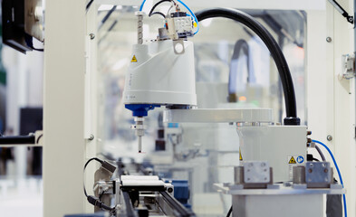 robot arm working in factory
