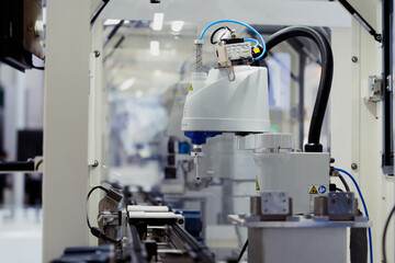 robot arm working in factory