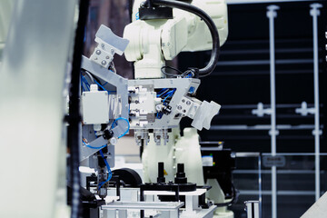 robot arm working in car factory