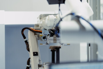 robot arm working in factory