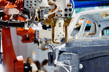 robot arm working in car factory