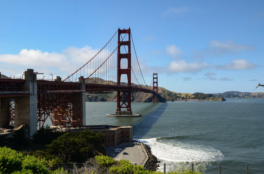 Beautiful view of famous Golden Gate Bridge with blue sky and clouds on a sunny day in summer San Francisco Bay Area California USA