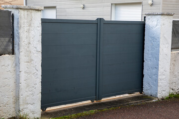Aluminum double high modern grey portal closed of suburb garden gray door metal house