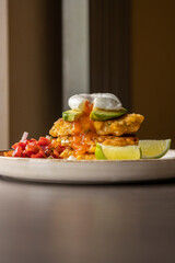  delicious corn fritters with salsa and poached egg – the perfect brunch