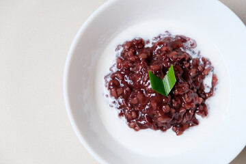 Bubur ketan hitam, Indonesian traditional dessert made from black sticky rice with coconut milk, sugar and pandan leaf.