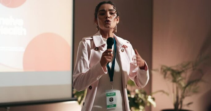 Seminar, public speaking and business woman with presentation on leadership development in office. Microphone, speaker and female hr director with pitch at corporate conference, event or workshop.