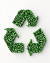 Green recycling symbol made of lush leaves