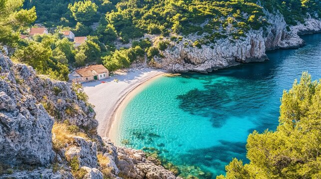 A hidden turquoise beach lies beneath Lubenice village on the beautiful Cres Island in Croatia.
