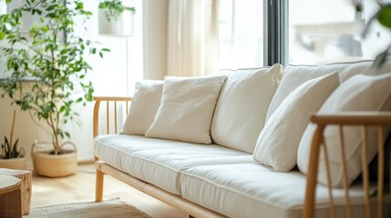 Naklejka premium A modern living room showcases a cozy sofa and plants