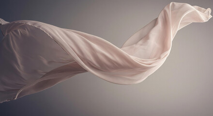 Fototapeta premium Elegant Flowing Nude Silk Fabric Drape Studio Shot Fashion Textile Background