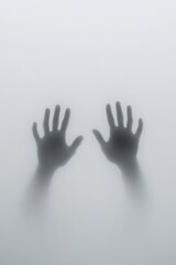 Hands through frosted glass