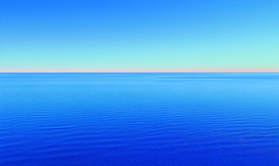 Obraz premium Tranquil Ocean Horizon with Clear Blue Sky Above Water Surface