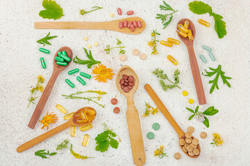 Plant based supplements, natural vitamins, fresh herbs and flowers. Organic ingredients medication