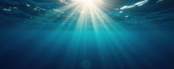 Obraz premium Dark blue surface, sunlight dappled, underwater view, visual, exploration