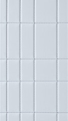 Naklejka premium The surface texture of artificial leather is light gray, the surface is stitched in the form of diamonds, squares, rectangles. Eco-leather in a kilt. 