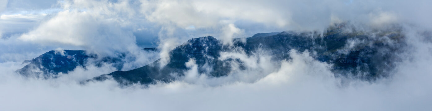 Clouds and mist around the peaks of Bale Mountains National Park. Ethiopia.