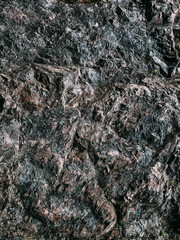 Rugged Natural Rock Surface with Texture and Organic Patterns in Outdoors