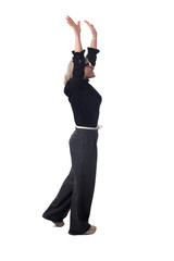 side view of happy woman raising arms on white background