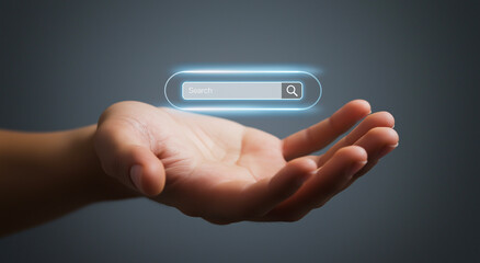 Hand holding glowing search bar, digital interface innovation for internet browsing, artificial intelligence, and online technology concept