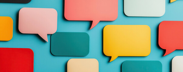 Colorful speech bubbles on a blue background for communication themes.
