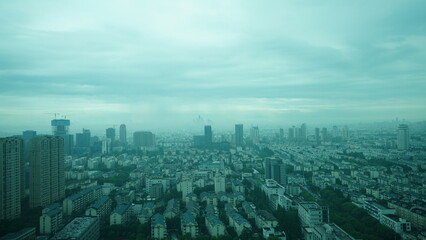 The panoramic city view in the rainy and cloudy day