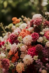 Close up shot of a diverse and vibrant flower arrangement showcasing a variety of colors textures and blooms