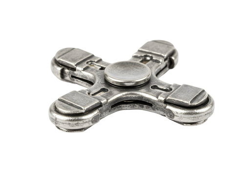 Close-up View of a Metallic Fidget Spinner on a White Background with Shadows and Reflective Surfaces Highlighted - Powered by Adobe