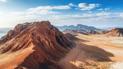 Fototapeta premium Scenic aerial view of dramatic mountainous desert terrain