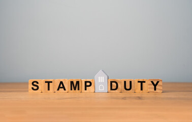Stamp duty concept. Taxes assessed during the transfer of real estate between two parties. Buying...