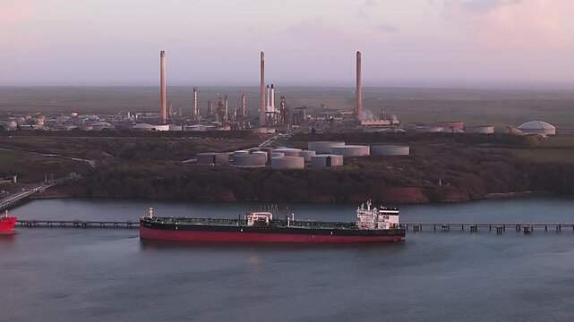 Valero Pembroke Refinery in the UK with a ship docked near the refinery