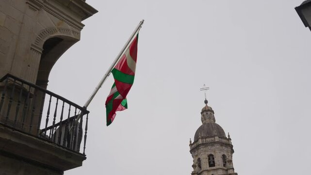 The flag of the Basque Country flutters in the wind