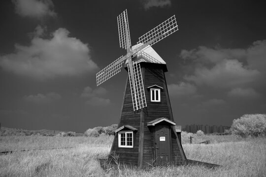 old windmill in black and white