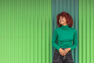 girl on the street outdoors on green background