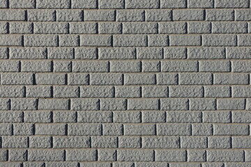 Backdrop - light grey painted brick veneer wall