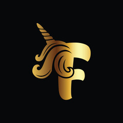 Golden unicorn logo with elegant letter F design on a black background for luxury branding and identity