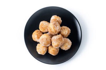 Traditional Carnival fritters or buñuelos isolated on white background