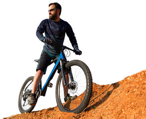 Cyclist in pants and fleece jacket on a modern carbon hardtail bike with an air suspension fork....