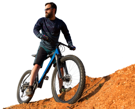 Cyclist in pants and fleece jacket on a modern carbon hardtail bike with an air suspension fork. The guy on the top of the hill rides a bike.