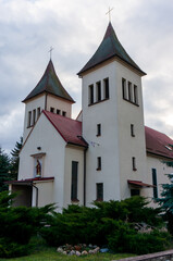 Fototapeta premium Church of the Sacred Heart of Jesus (kościół Najświętszego Serca Pana Jezusa), single-nave building with two towers. Krzyż Wielkopolski, Poland.