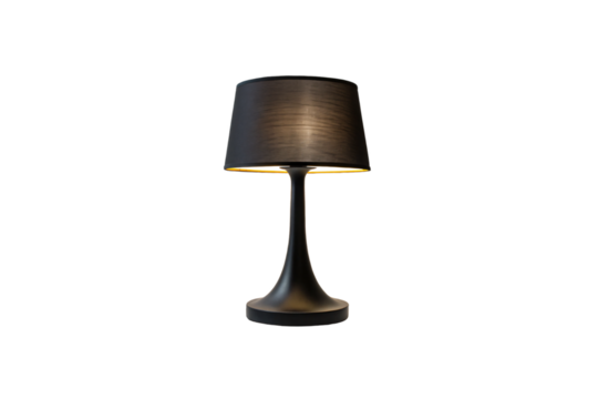A sleek modern table lamp with a black shade and smooth curved base casts a warm glow, blending minimalism with elegance, isolated on a transparent background