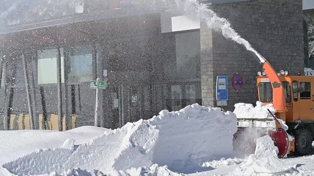 Snow Plow Clearing Heavy Snow. Winter Road Maintenance
