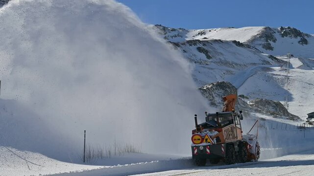 Snow Plow Clearing Heavy Snow. Winter Road Maintenance