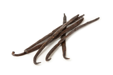 Obraz premium Vanilla pods isolated on white background. Vanilla flowers and seeds. vanilla stick bean. Aromatic spicy spice for pastries and desserts. Seasoning. Space for text. Copy Space