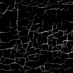 Cracked black surface texture with fine detailed fracture lines