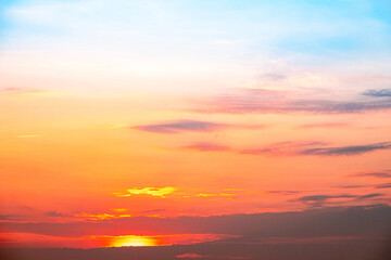 Sky,sunset, beautiful , luxury soft gradient orange gold clouds and sunlight on the blue sky perfect for the background, Sunrise on morning or everning in winter warm time ,Twilight summer,silhouette