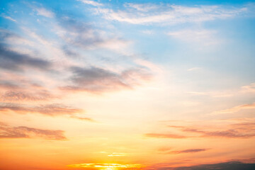Sky,sunset, beautiful , luxury soft gradient orange gold clouds and sunlight on the blue sky perfect for the background, Sunrise on morning or everning in winter warm time ,Twilight summer,silhouette